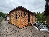 Bootshaus Mirow mit Motorboot und großer Terrasse