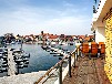 Ferienwohnung am Yachthafen Waren Müritz - Motorboot im Hafen (optional)