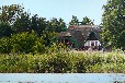 Ferienwohnung am Barther Bodden mit traumhaftem Seeblick & Boot