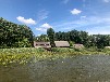 Bootshaus am Malchiner See mit Motorboot