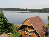 Ferienwohnung im Bootshaus am Schwarzer See mit Seeterrasse und Ruderboot