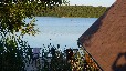 Ferienwohnung im Bootshaus am Schwarzer See - mit Seeterrasse & Ruderboot