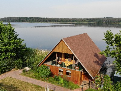 Ferienwohnung im Bootshaus Schwarzer See mit Seeterrasse und Ruderboot