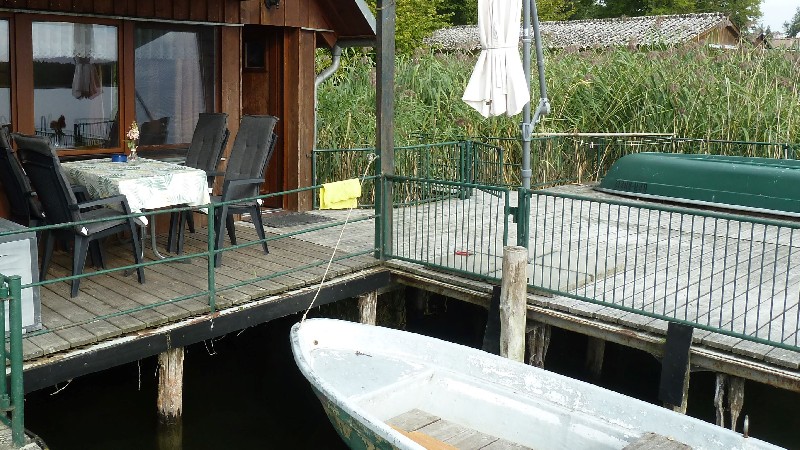 Ferienwohnung im Bootshaus am Schwarzer See - mit Seeterrasse & Ruderboot