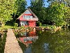 Ferienhaus Schweriner See mit Boot - Rotes Reetdachhaus