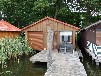 Bootshaus am Mirower See mit Motorboot