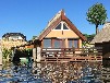 Reetgedecktes Bootshaus am Mirower See