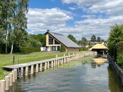 Mirow Ferienhaus am Wasser mit Boot und Garten - 8 Personen