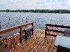Bootshaus am Güstrower Inselsee mit Ruderboot