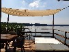 AUSSERGEWÖHNLICHES CHILLIGES PANORAMA-SEEBLICK BOOTSHAUS. DIREKT AUF DEM SEE BEI BERLIN!