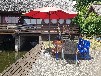 Bootshaus am Malchiner See mit Motorboot