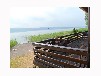 Bootshaus am Malchiner See mit Motorboot