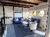 Bootshaus am Malchiner See mit Motorboot
