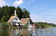 Urlaub im Bootshaus am Rätzsee - bei Mirow, mit Reetdach, Ruderboot, gr. Panoramafenster, in Traumlage, nur E-Motoren erl., Süd-Ostseite