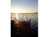 Bootshaus am Malchiner See mit Steg und Boot