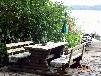 Bootshaus am Malchiner See mit Steg und Boot