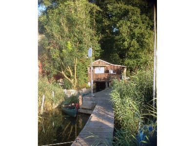 Bootshaus am Malchiner See mit Steg und Ruderboot - Motorboot (optional)