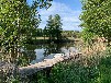 Landhaus-Villa am Fluss mit Steg und Boot