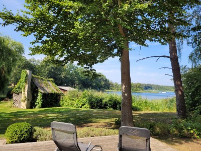 Ferienhaus am Zootzensee mit Steg und Boot