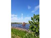 Großes Meer Ferienhaus mit Steg und Boot in Ostfriesland