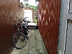 Bootshaus mit Motorboot an der Peene