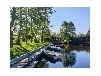 Großes Meer Ferienhaus mit Boot in Ostfriesland