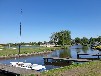 Großes Meer Ferienhaus mit Boot in Ostfriesland